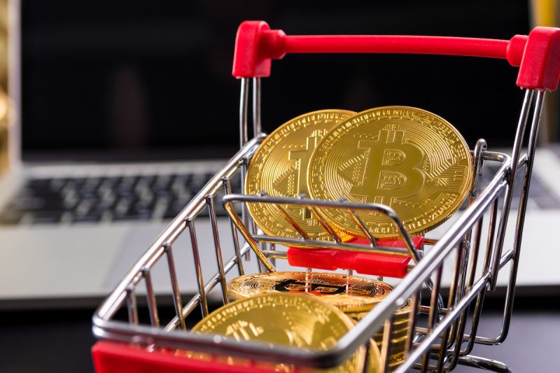 golden-coins-with-bitcoin-symbol-in-a-little-shopp-2022-12-16-03-17-30-utc.jpg